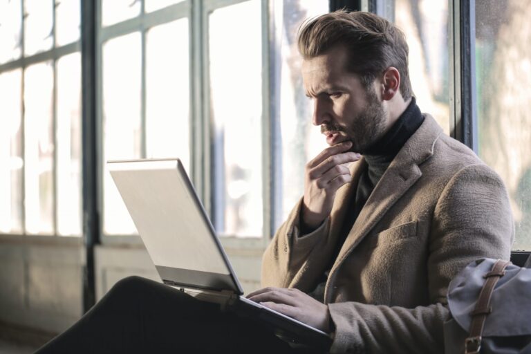 Man concentrating on laptop